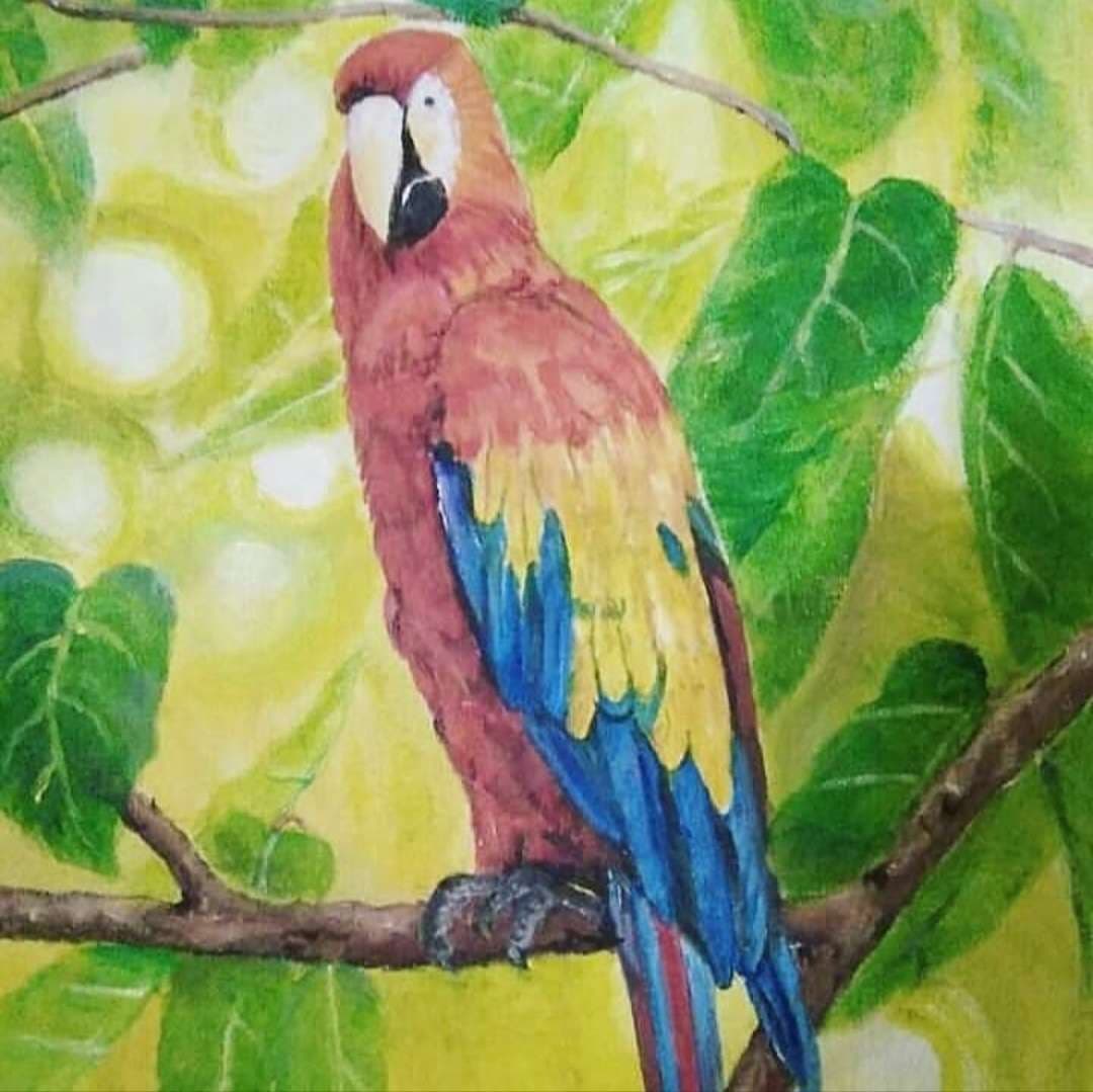 Painting of a parrot sitting in a tree done by John Roland Feruelo